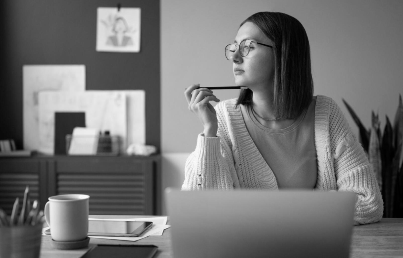 Professional analyzing financial reports and market trends